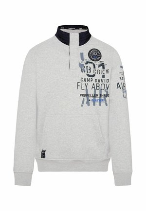 Lichtgrijze sweatshirt met hoge kraag, half-rits ontwerp, bedrukte graphics in donkerblauw en zwart, geribbelde manchetten en kangoeroezak.