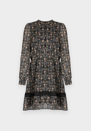 Μαύρο φόρεμα με σχέδιο, με μακριά μανίκια, που διαθέτει διαμαντέ σχέδιο σε μπεζ και καφέ χρώμα, και λευκή δαντέλα στο τελείωμα.