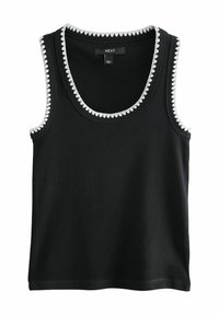Sort tanktop med ribbet tekstur, der har en hvid bølget kant omkring udskæringen og ærmehullerne. Etiket med teksten "NEXT."