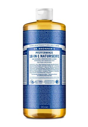 Klares bernsteinfarbenes Fläschchen von Dr. Bronner’s Pfefferminz 18-in-1 Naturseife mit blau-weißem Etikett, das Inhaltsstoffe und Produktdetails auflistet.