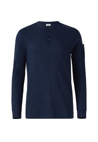Marineblaues Langarmshirt aus strukturiertem Stoff, mit rundem Halsausschnitt, Vierknopf-Leiste und einer aufgesetzten Tasche am linken Ärmel.