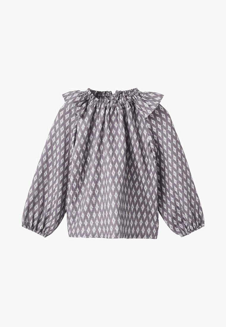 Siva bluzica s diamantnimi motivi, z nabranim ovratnikom, nabranimi detajli in dolgimi rokavi z elastičnimi manšeti. Narejena iz lahkega materiala.