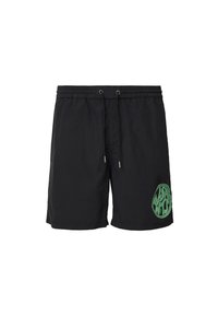 Bañador negro con cintura elástica y cordón, que presenta un logo gráfico verde en la parte inferior de la pierna izquierda. Material ligero.