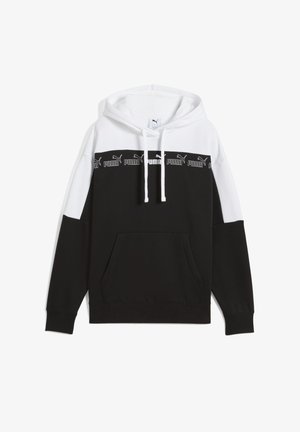 Hoodie med en svart och vit färgblockdesign, tillverkad av bomull, framficka och broderad logoband över bröstet.