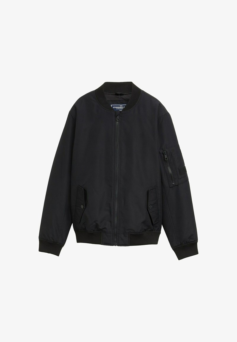 Schwarze Bomberjacke aus Nylon mit Reißverschluss vorne, geripptem Kragen und Bündchen. Verfügt über zwei seitliche Taschen und eine Armtasche mit Reißverschluss.