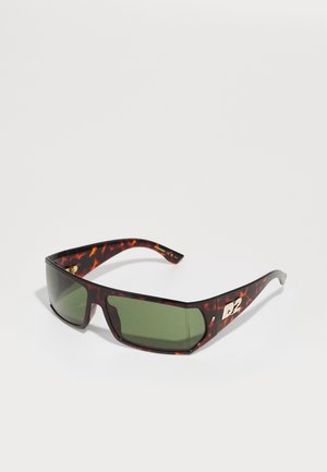 Tortoiseshell sunglasses with green lenses, angular shape, and gold accent featuring 'D2' logo on the arm. Plastic frame with a glossy finish.