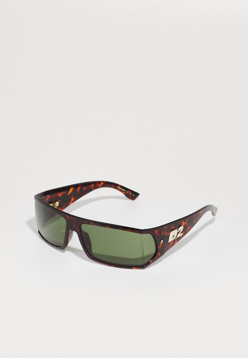 Ochelari de soare cu model ţestoasă, lenti verzi, formă unghiulară și accent auriu cu logo-ul „D2” pe braț. Cadru din plastic cu finisaj lucios.
