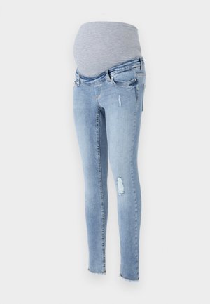 Jeans skinny per maternità in denim azzurro chiaro con un morbido elastico grigio in vita, dettagli strappati e una vestibilità affusolata.