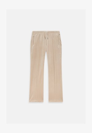 Beige Samt-Jogginghosen mit einer Kordelzug-Taille, zwei seitlichen Taschen und dezenten Seitennähten. Mit besticktem Logo auf der Vorderseite.