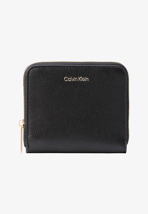Portofel din piele neagră Calvin Klein cu fermoar și logo auriu, compact și dreptunghiular, cu închidere cu fermoar pe trei părți.