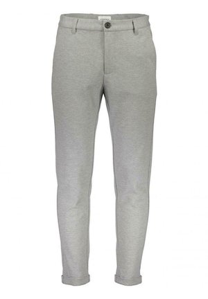 Lysegrå sweatpants med slim fit, elastisk talje, frontknaplukning og opslåede manchetter. Lavet af et blødt, tekstureret stof.