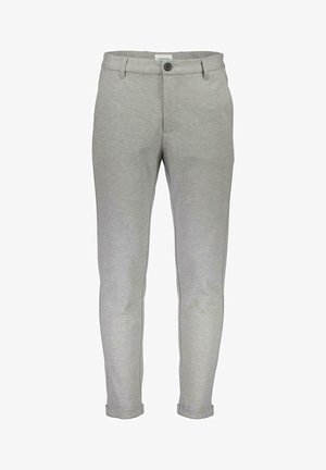 Lichtgrijze sweatpants met een slim fit, elastische tailleband, voorknoopsluiting en omgerolde manchetten. Gemaakt van een zachte, gestructureerde stof.