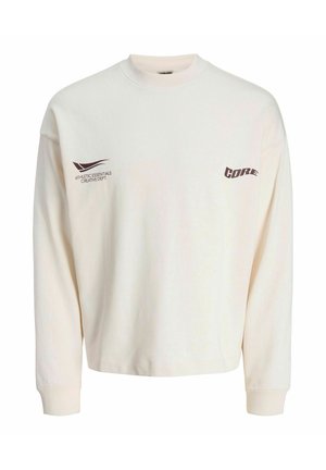 Cremefarbener Sweatshirt mit langen Ärmeln und rundem Halsausschnitt. Mit der Aufschrift "ATHLETIC ESSENTIALS CREATIVE DEPT." und "CORE" in Braun bedruckt.