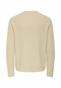 Beige gerippter Pullover mit langen Ärmeln und Rundhalsausschnitt. Texturiert, mit weichem Aussehen und entspannter Passform.