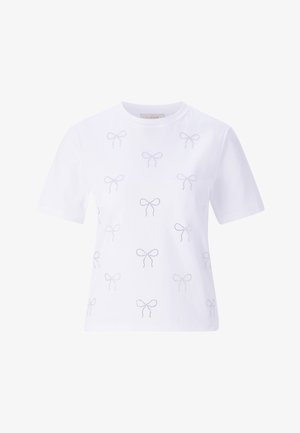 Balta kokvilnas T-kreklu ar atkārtotu mazu izšūtu loku rakstu gaišā krāsā. Īsas piedurknes un apaļa kakla izgriezums.