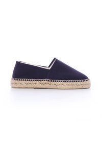 Scarpa slip-on in tela blu con suola in iuta intrecciata e tomaia testurizzata, caratterizzata da un design minimalista e senza hardware visibile.