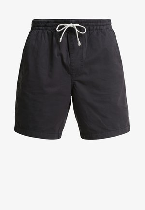 Czarne bawełniane szorty z elastycznym pasem, sznurkiem do regulacji, kieszeniami bocznymi i luźnym krojem. Gładka tekstura z minimalnym zdobieniem.