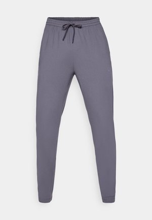 Szare spodenki sportowe z elastycznym pasem i sznurkiem. Gładka faktura, zwężane nogawki, z małym logo po bokach.