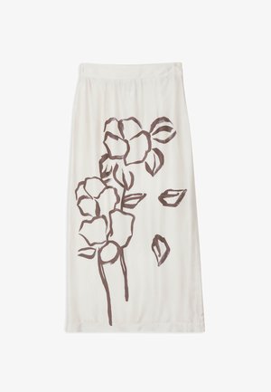 Jupe midi blanche taille haute, arborant un grand motif floral abstrait marron sur un côté.