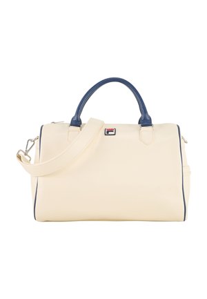 Sac polochon couleur crème avec poignées bleu marine, bandoulière détachable et petit logo rectangulaire brodé au centre à l'avant.