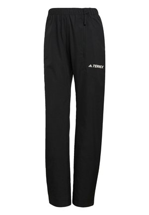 Black athletic pants with an elastic waistband, zippered side pocket, tapered legs, and a white "TERREX" logo on the front.