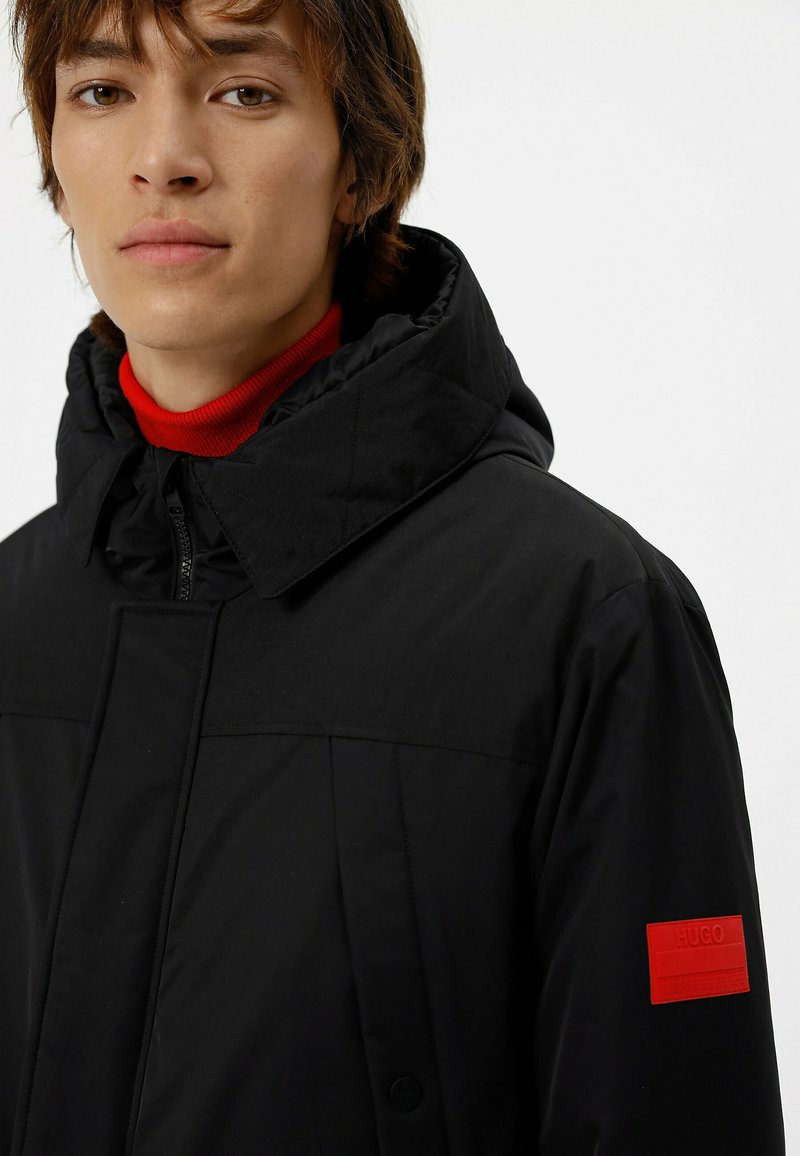 Herren Trenchcoats | HUGO MELMUS Parka black/schwarz - ZV03291 Herren Trenchcoats | HUGO MELMUS Parka black/schwarz - ZV03291