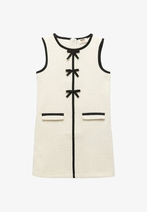 Ärmelloses cremefarbenes, strukturiertes Kleid mit schwarzem Rand, drei schwarzen Schleifen auf der Vorderseite und zwei vorderen Taschen mit schwarzen Kanten.