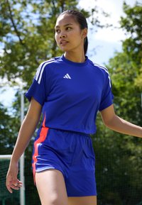 adidas Performance TIRO 24 JUMPSUIT - Overal - lucid blue/app solar red