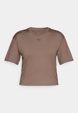 Brown short-sleeve T-shirt made from a smooth material. Features a round neckline and a subtle logo on the chest. Cropped design.