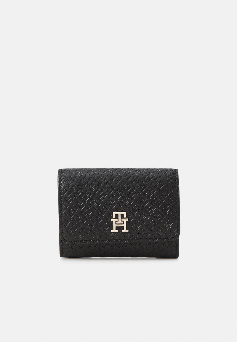 Black textured leather wallet featuring a geometric pattern, fold-over design, and a gold-tone logo accent on the front.