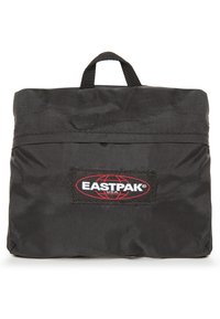 Musta nylon laukku suorakaiteen muotoinen. Varustettu yläkahvalla ja etupuolella vetoketjullinen tasku. Selkeä punainen ja valkoinen "EASTPAK" -logo.