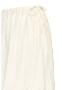 Jupe portefeuille texturée blanc cassé avec un nœud noué à la taille élastique, longueur mi-mollet avec un tissu doux et fluide.