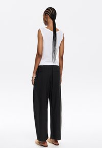 Bimba Y Lola Auduma bikses - black