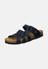 Black, strappy slide sandal with a cork footbed and rubber outsole. Features an adjustable buckle and woven strap design.