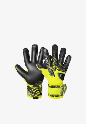 Pair of black and neon yellow goalkeeper gloves with textured palms and adjustable wrist straps showing brand name "Reusch" and "ATRAX".