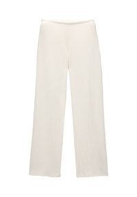 Pantalons large couleur crème en tissu texturé avec une taille élastique, posés à plat sur un fond blanc.