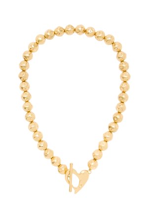 Naszyjnik z pozłacanych koralików, składający się z gładkich i fakturowanych okrągłych koralików z zapięciem na przełącznik w kształcie serca, wykończony polerowanym połyskiem.