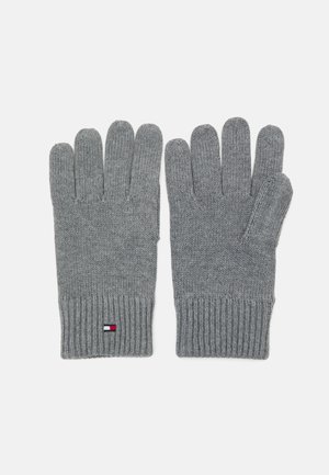 Mănuși tricotate gri cu manșete în dungi, dotate cu un design pentru cinci degete și un mic logo cu accente roșii, albe și albastre la încheietură.
