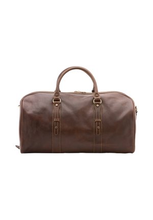Sac de voyage en cuir marron avec deux poignées supérieures, quincaillerie dorée et surpiqûres décoratives. Texture lisse et forme structurée.
