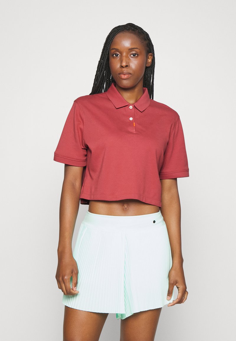 Nike Golf THE POLO Sports Tshirt canyon rust/dark red Zalando.ie