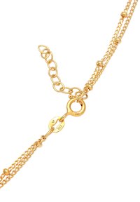 Collana in oro con un design intrecciato e testurizzato. Presenta una chiusura a moschettone e una stampa in argento 925. Lunghezza regolabile con link aggiuntivi.