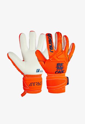 Orange målvogterhandsker med hvid latex håndflade. Har tekstureret bagside, justerbar håndledsrem og "BE THE ONE" trykt i blå.
