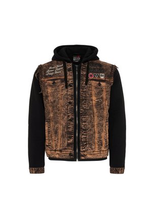 Jeansjacke mit einer verblassten braunen Vorderseite und schwarzen Ärmeln, die zwei Brusttaschen, schwarze Knöpfe und gestickte Details aufweist.