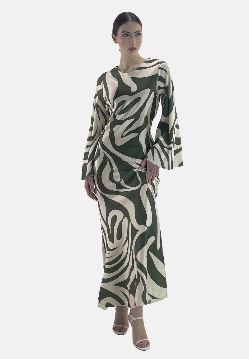 Robe à manches longues verte et crème, ornée d'un motif abstrait ondulé. Fabriquée en tissu lisse, elle présente une coupe décontractée et des manches évasées.