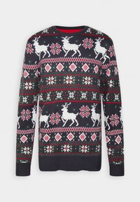 Virkat tröja med marinblå bakgrund, mönster av renar och snöflingor i vitt, rött och grönt, med rund hals och ribbade ärmslut.