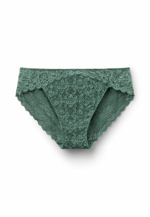 Kanten slip in gedempt groen, met bloemmotieven en gekartelde randen. Gemaakt van zacht, gestructureerd kantmateriaal.