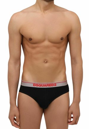 Mutande nere a briefs con una fascia grigia caratterizzata da lettere rosse. Tessuto liscio e design aderente, che mette in risalto la forma.