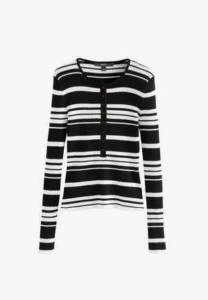 Long-sleeve, ribbed top in black and white horizontal stripes. Features a round neckline and front button placket with six black buttons.