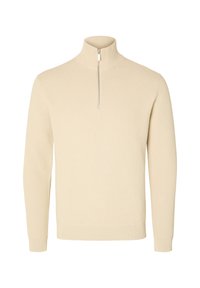Světlý béžový svetr na zip s vysokým límcem, vyrobený z žebrované látky; má dlouhé rukávy a přiléhavý pas.