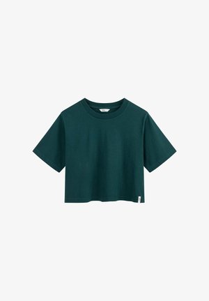 Dark green cropped short-sleeve cotton t-shirt with crew neck and small white brand tag on bottom hem.